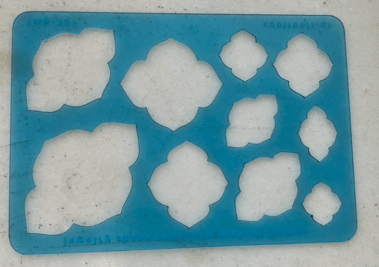 Jewelry template for tracing shapes onto metal