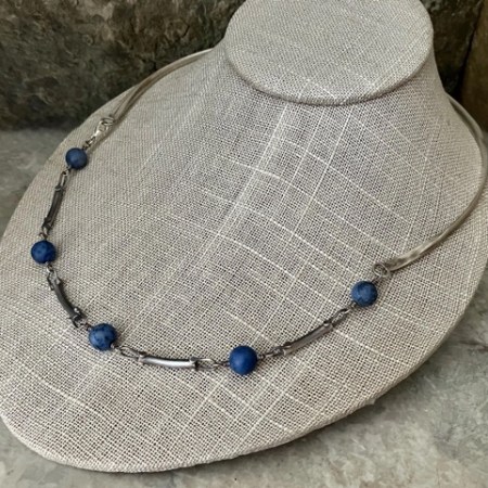 Handmade rustic silver necklace with spaced out blue beads